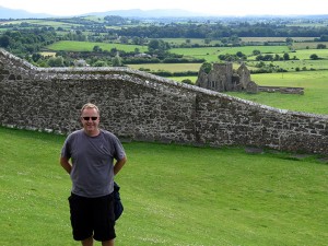 Kevin on the grounds, other ruins in distance