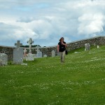 Dawn walks through the graveyard