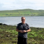 Kevin standing on slippery seaweed