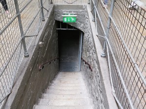 Stairs leading down to the kitchen and basement