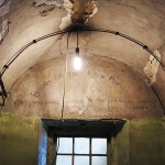 A prisoner carved these words into the wall in the old wing