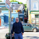 Kevin and a street sign