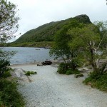 A rocky lakeside beach