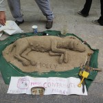 An artist created a new and different dog sand sculpture every day