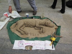 An artist created a new and different dog sand sculpture every day