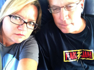 Kevin & Dawn in PJ shirts on the flight to CVG